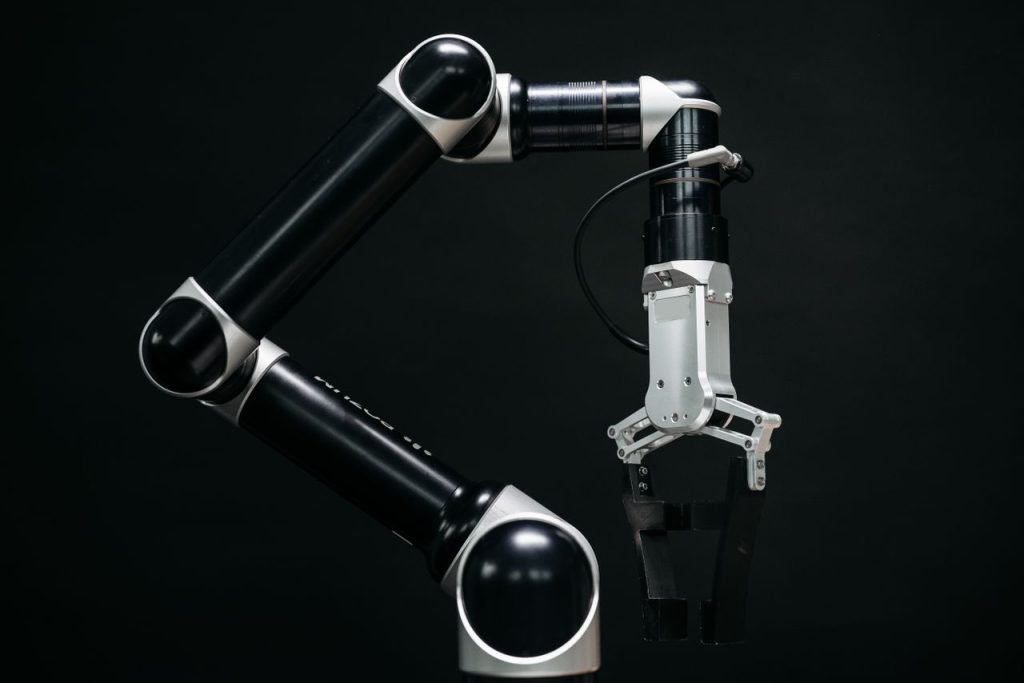 Crafting Captivating Headlines: Your awesome post title goes here Close-up of a mechanical robotic arm with a dark background, showcasing advanced technology.